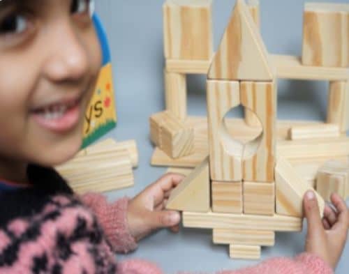 wooden rocket block toy with baby