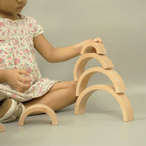 Girl Play with Natural Wooden Arch Stacker Toy