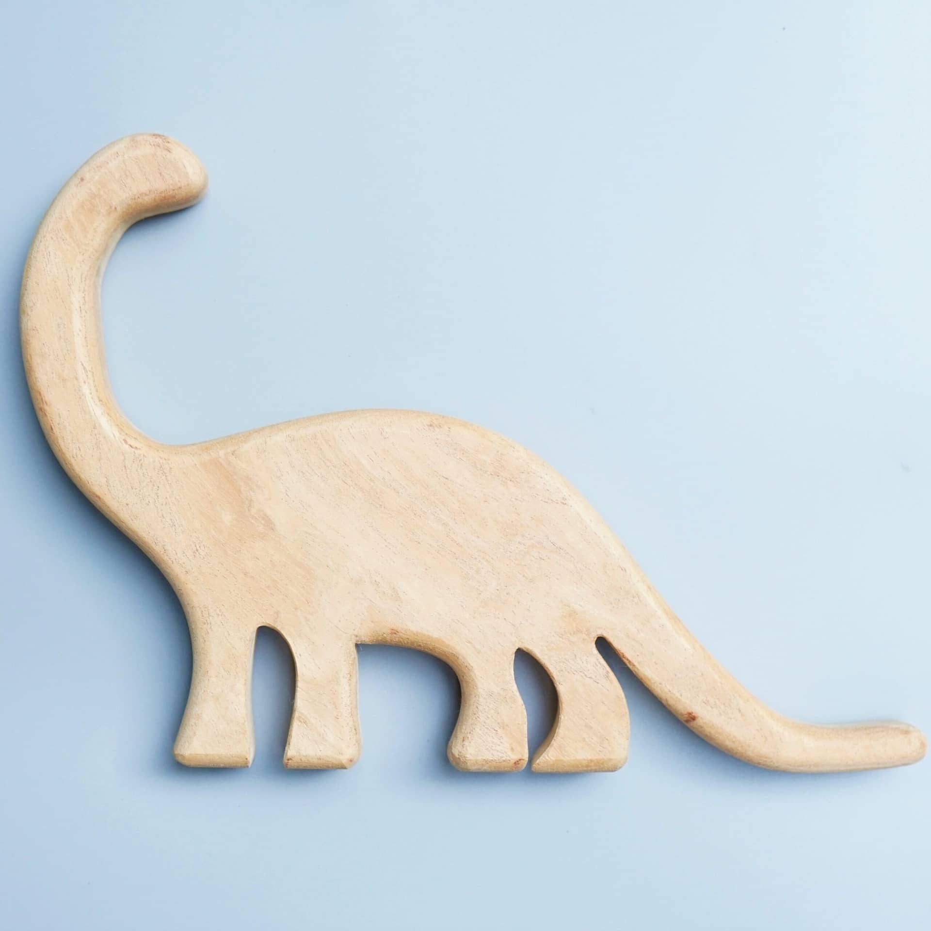 natural neemwood dinosaur toy