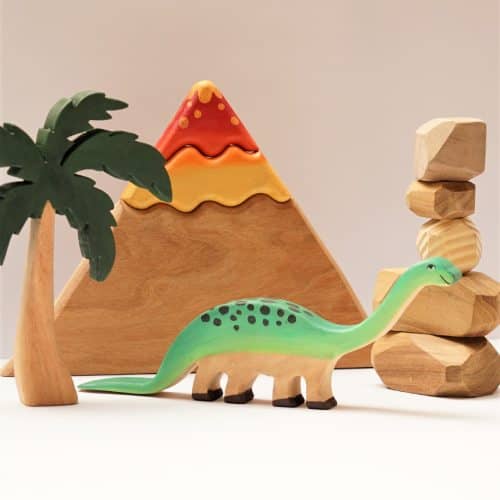 colorful wooden dinosaur toy with tree