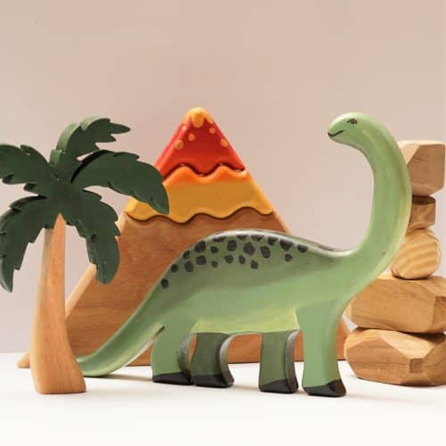 Wooden dinosaur toy with tree