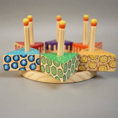 Cutting wooden cake toy with candle